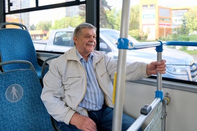Man on bus sized
